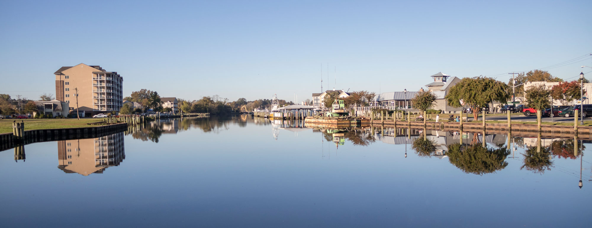 bay water with homes on sides